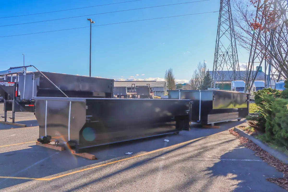 Roll-off dumpster ready for waste disposal at job site for Construction Dumpster Rental in South Weber